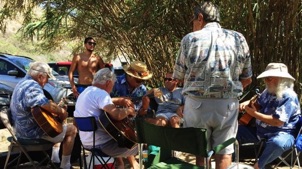 With good friends and great musicians.  Jamming at the beach.
